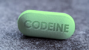 green pill with codeine imprint